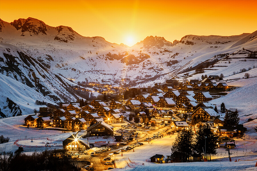 Stand spellbound as you take in the stunning vista of Saint Jean D'Arves, France, at sunset.